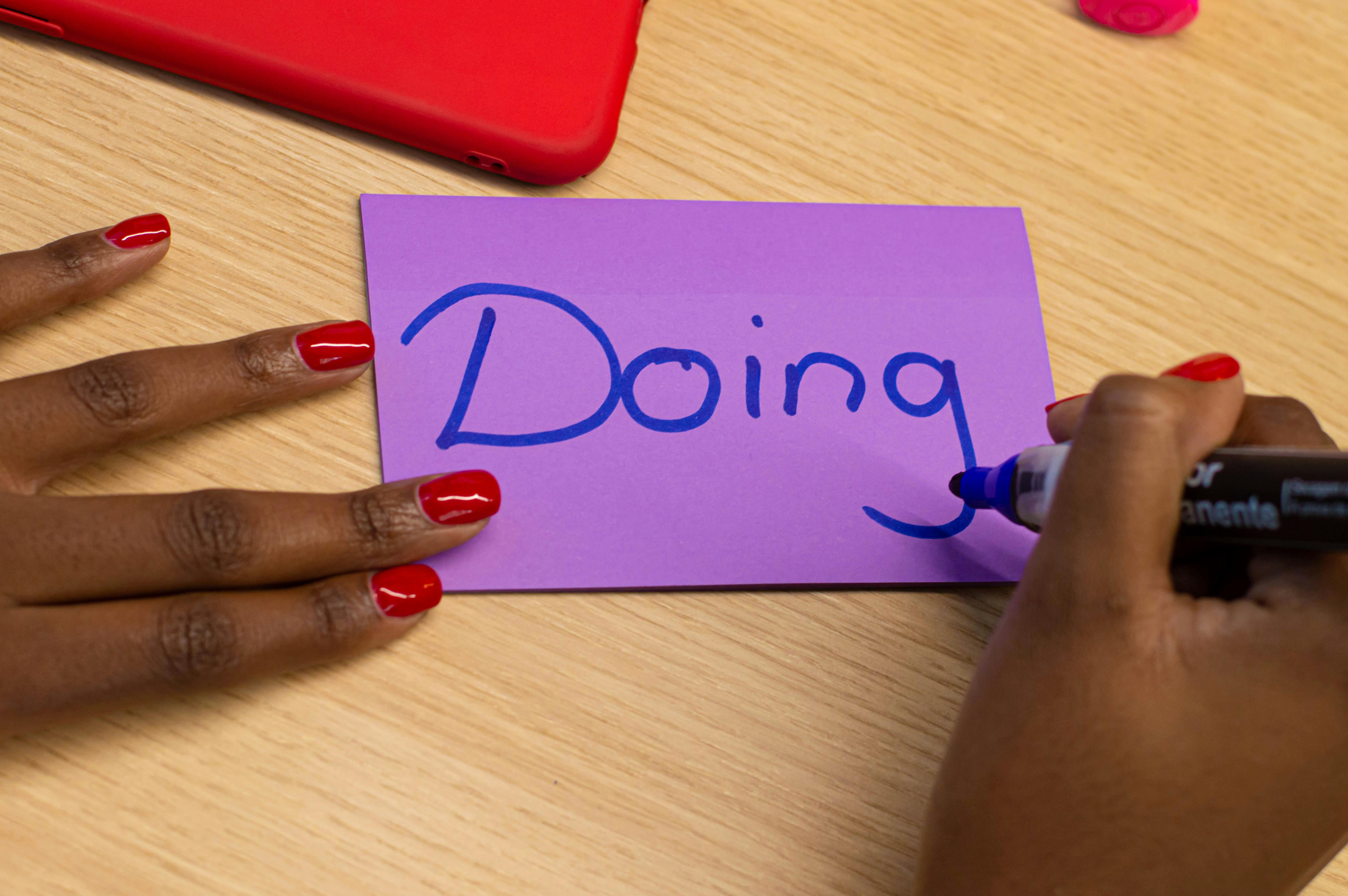 Workshop participant writing goals during a Built To Rise session